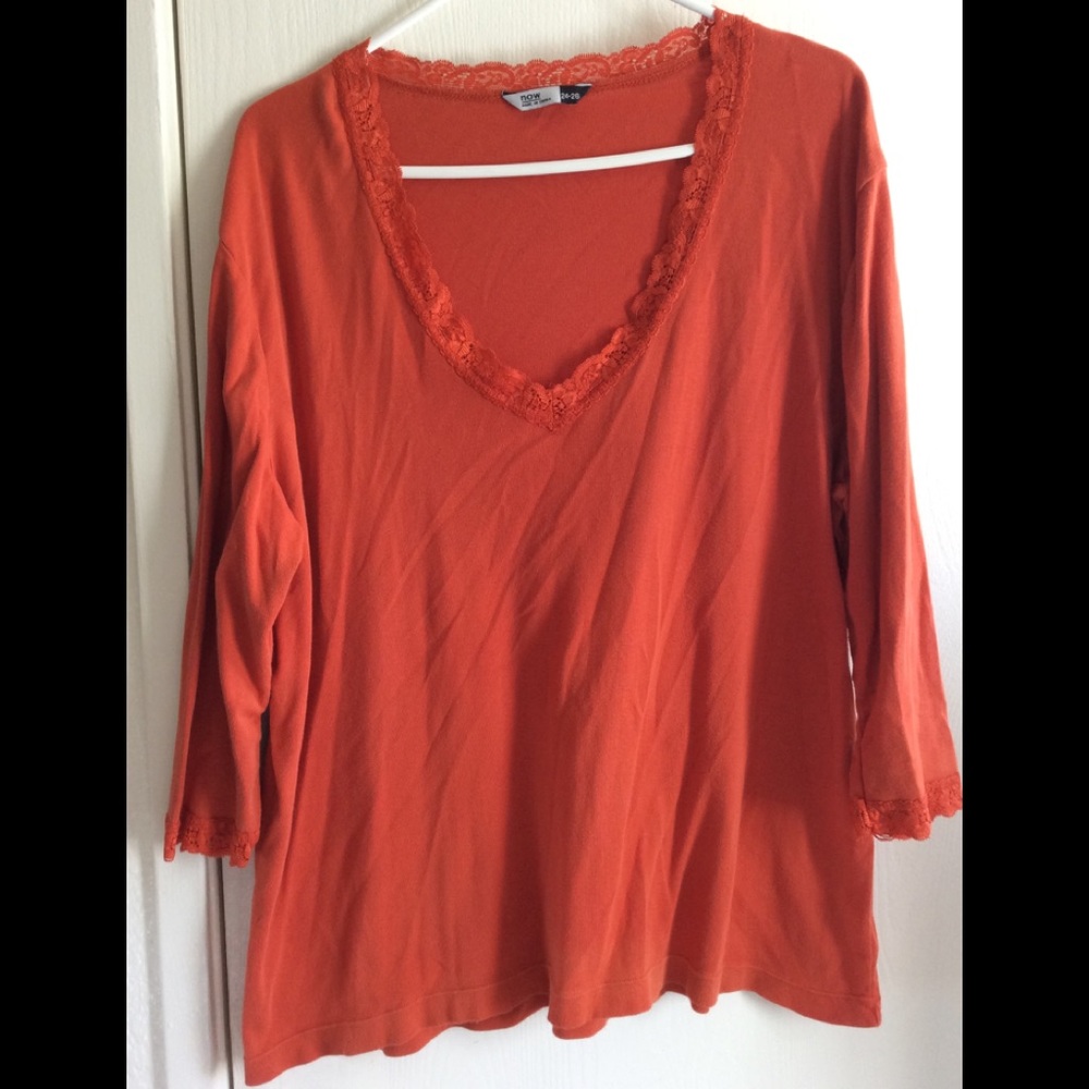 Orange top.  Size 24/26